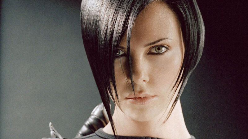 Woman with Black Hair — Serious, Photograph, Shoulder Armor