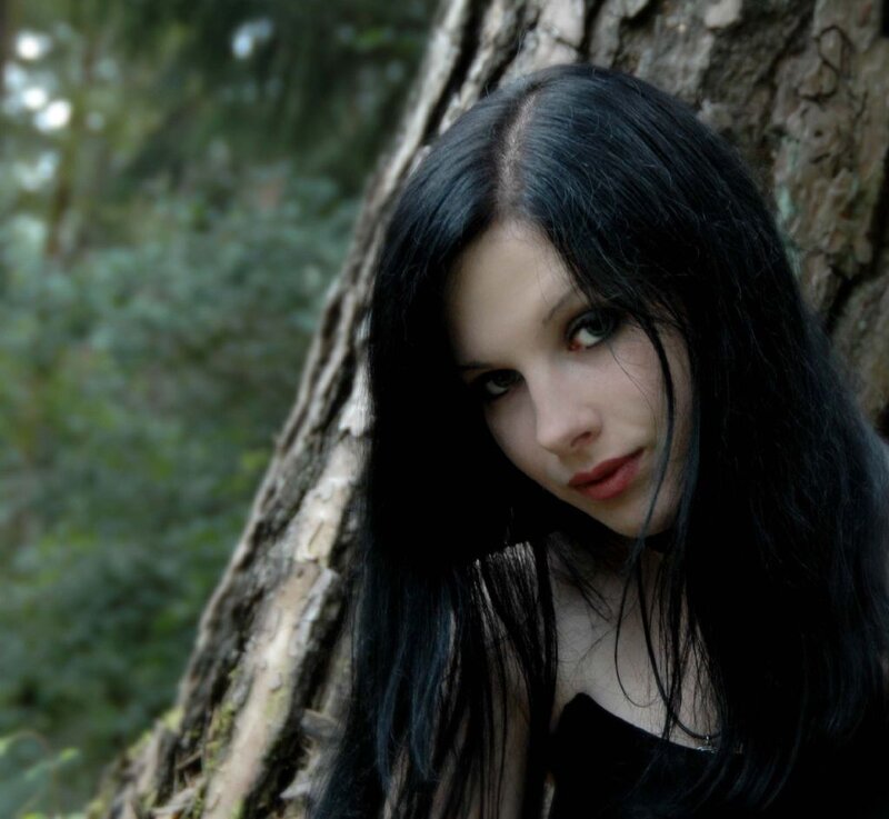 Woman with Black Hair — Serious, Photograph, Tree