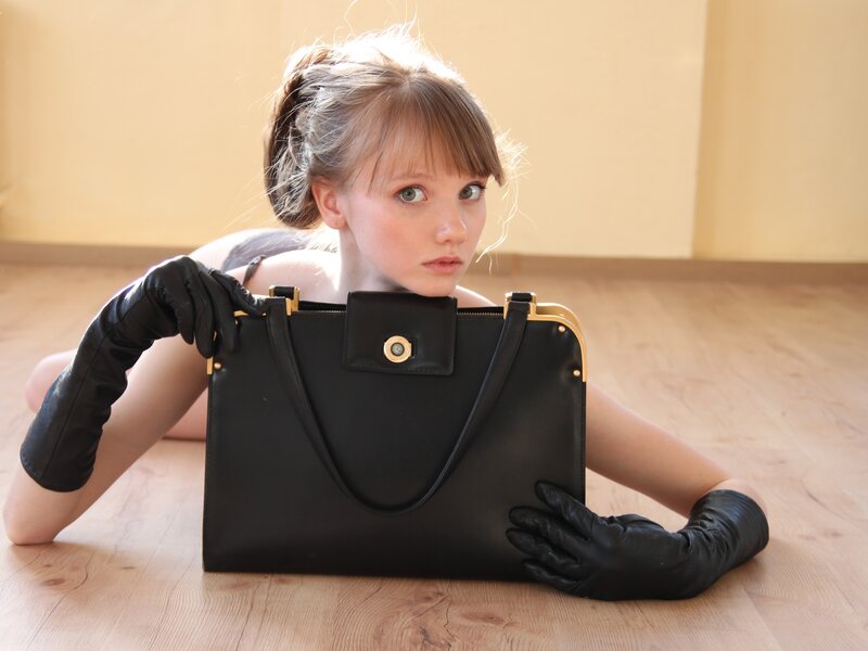 woman with black handbag