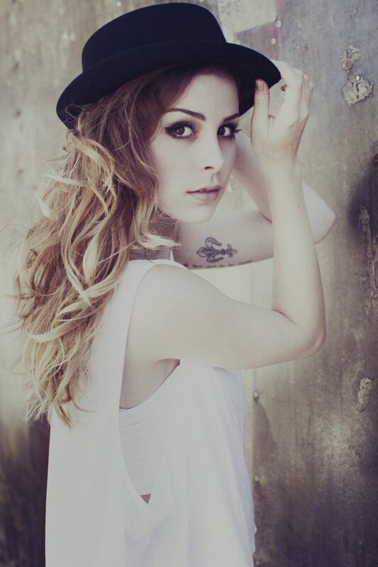 Woman with Black Hat — White, Dramatic, Photograph