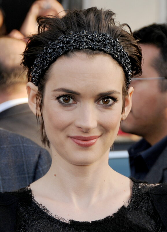 woman with black headband