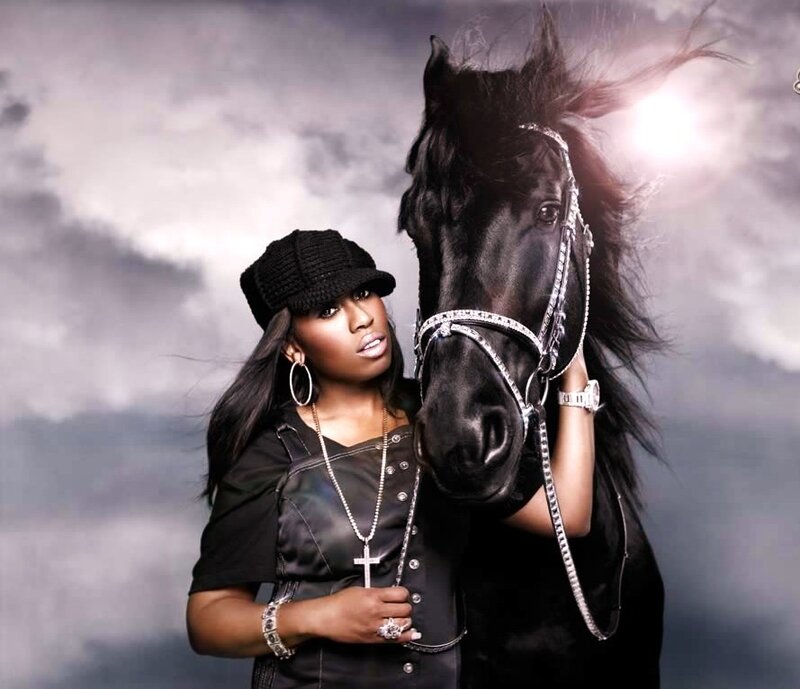 Woman with black horse