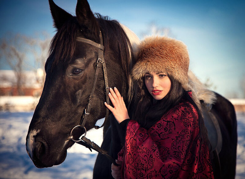 Woman with Black Horse — Dramatic, Winter, Photograph