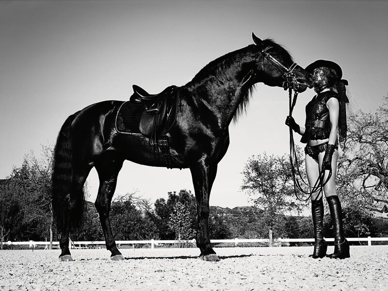 woman with black horse