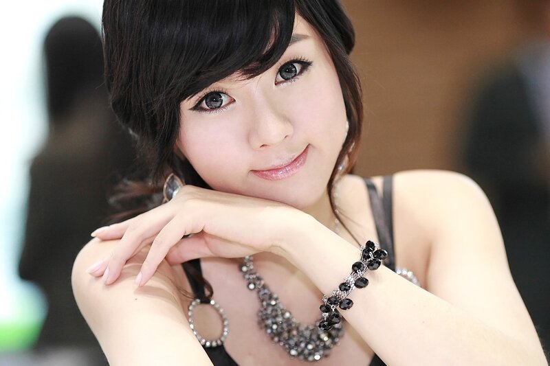 woman with black jewelry