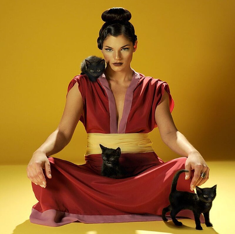 Woman with Black Kittens