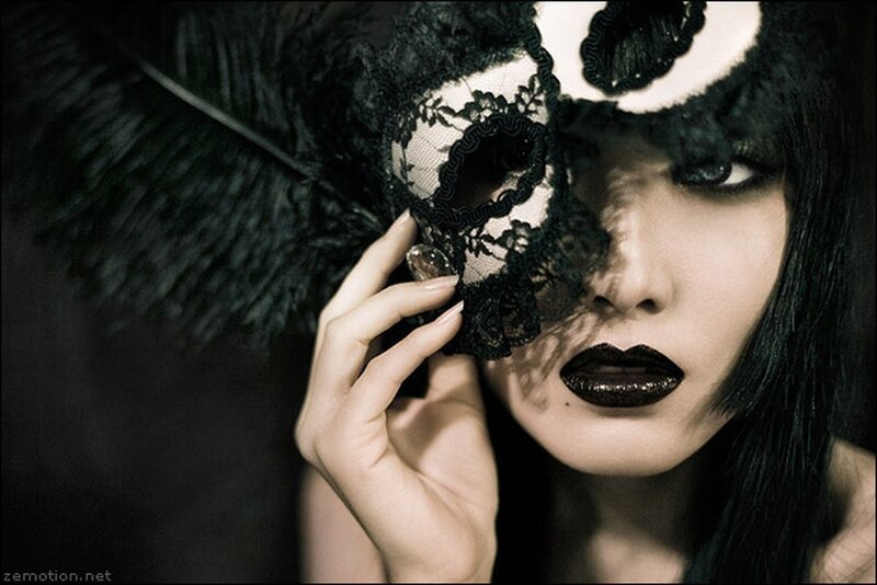 woman with black lace mask