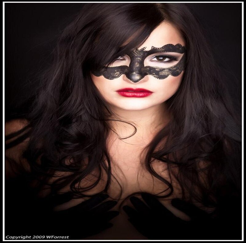 woman with black lace mask