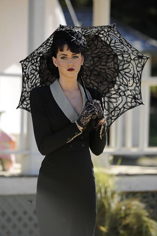 woman with black lace umbrella