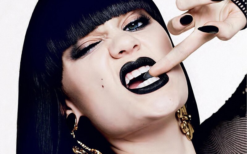 woman with black lipstick and bangs