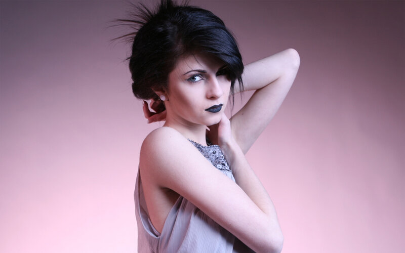 woman with black lipstick posing