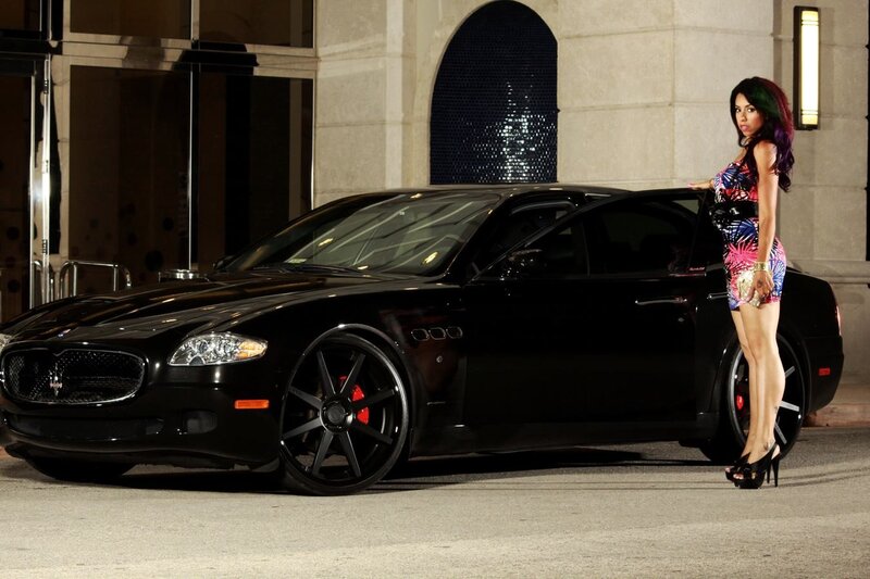 Woman with black Maserati