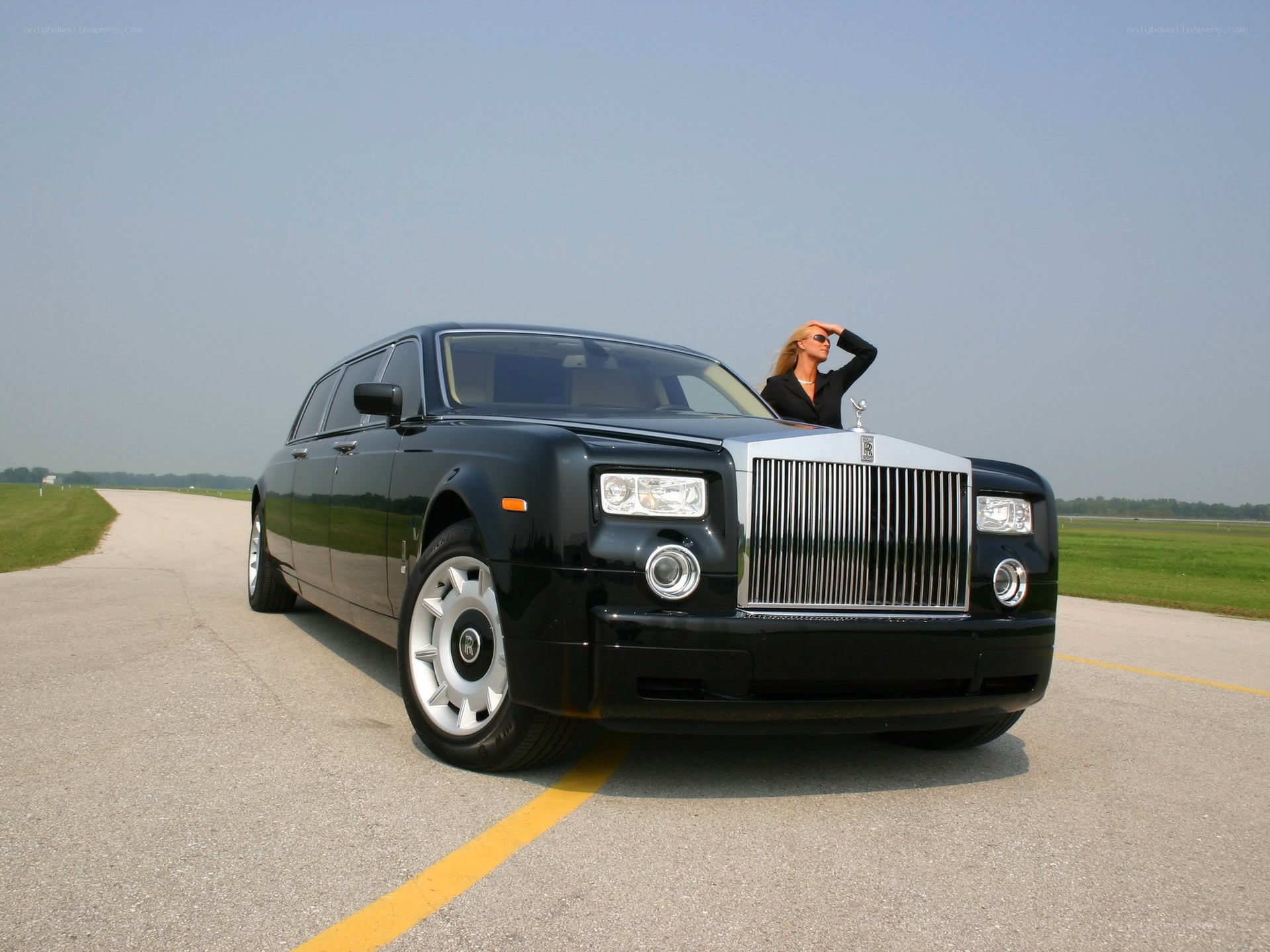Woman with black Rolls-Royce