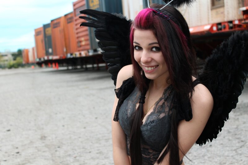 Woman with black wings