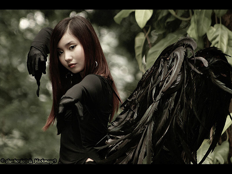 woman with black wings