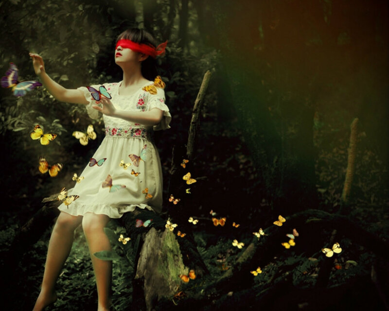 Woman with Blindfold in Forest