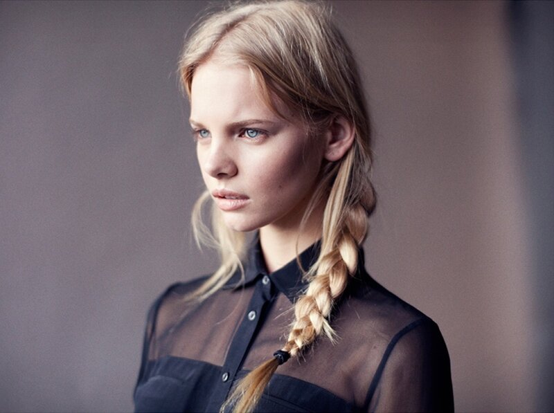 Woman with Blonde Braid — Black, Serious