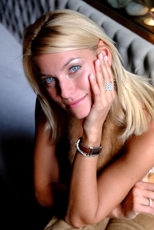 woman with blonde hair and blue eyes