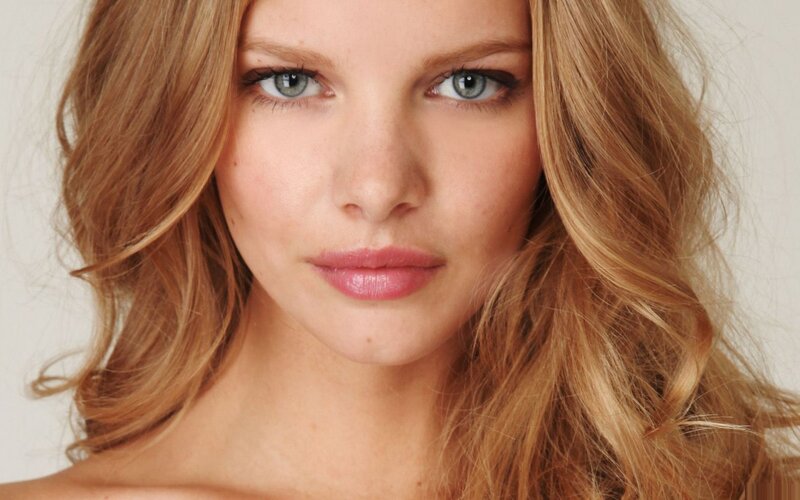 woman with blonde hair and blue eyes