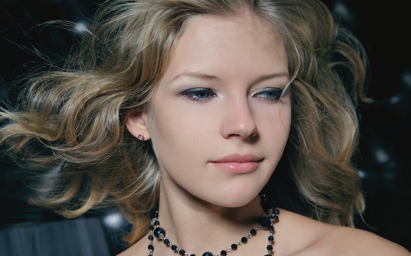 woman with blonde hair and blue eyes