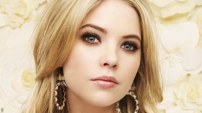 woman with blonde hair and blue eyes