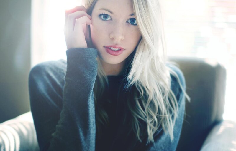 woman with blonde hair and blue eyes