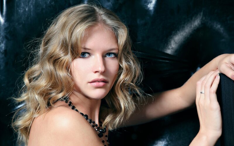 woman with blonde hair and blue eyes