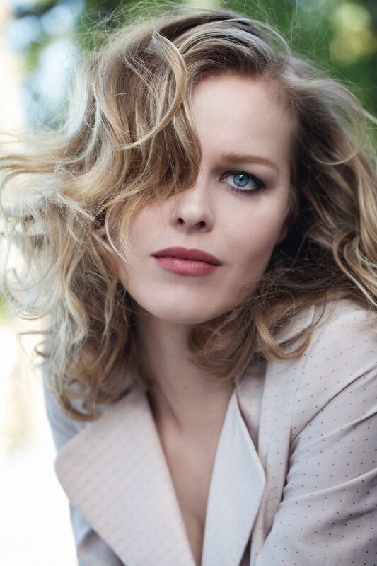 woman with blonde hair and blue eyes
