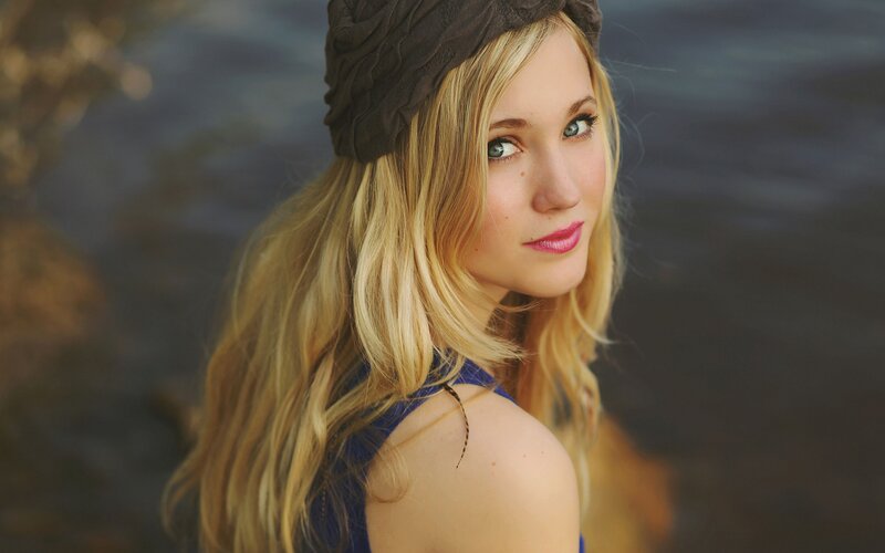 woman with blonde hair and blue eyes