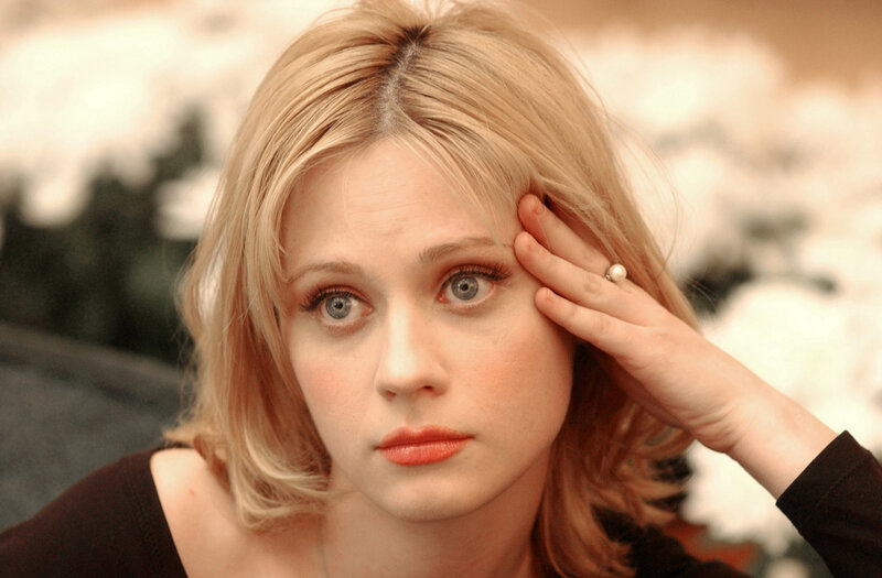 woman with blonde hair and blue eyes