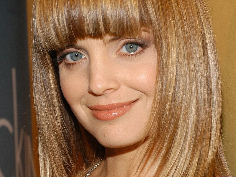 woman with blonde hair and blue eyes