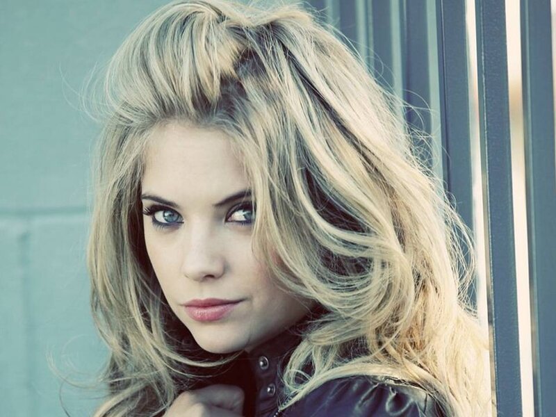 woman with blonde hair and blue eyes