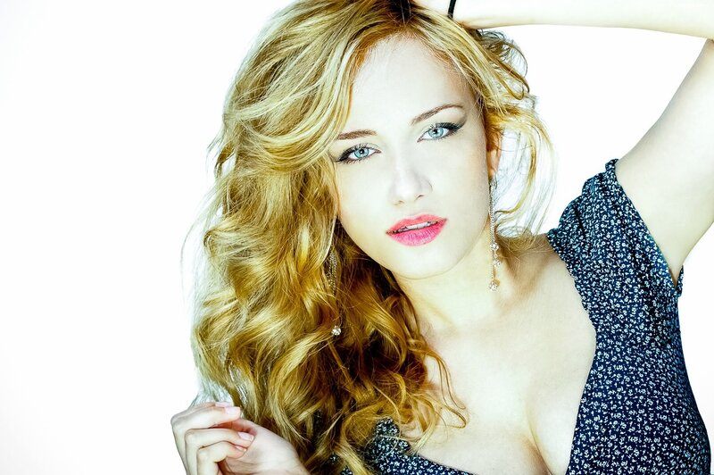 woman with blonde hair and blue eyes