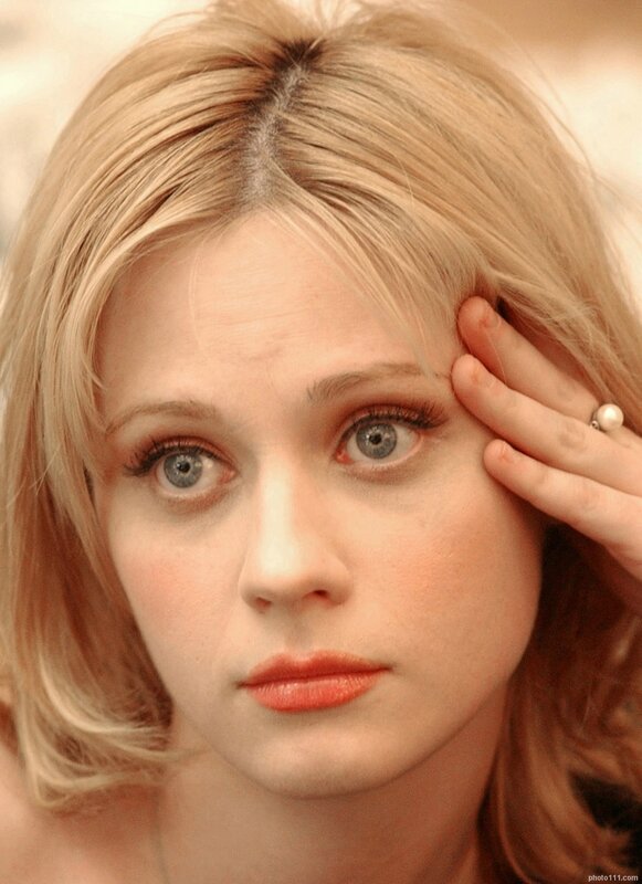 woman with blonde hair and blue eyes