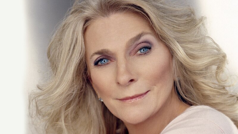woman with blonde hair and blue eyes