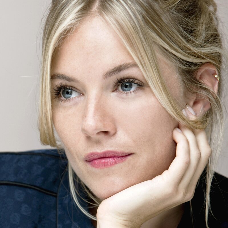 woman with blonde hair and blue eyes