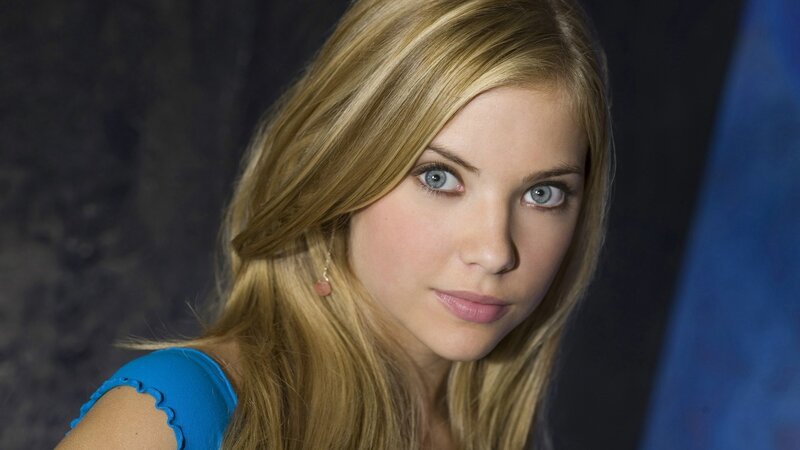 woman with blonde hair and blue eyes