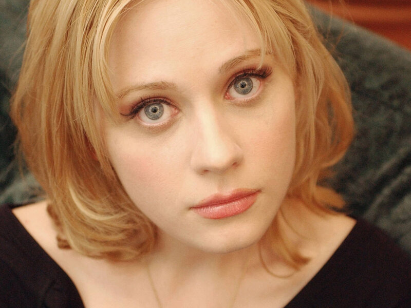 woman with blonde hair and blue eyes
