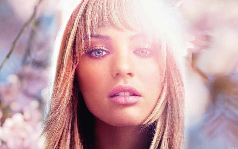 woman with blonde hair and blue eyes