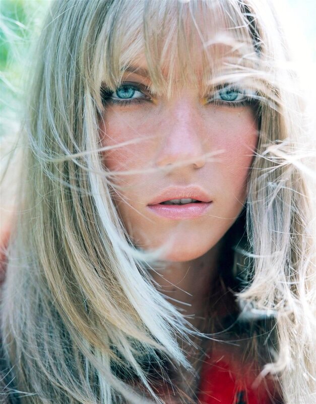 woman with blonde hair and blue eyes