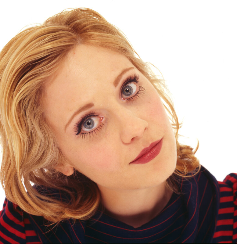 woman with blonde hair and blue eyes