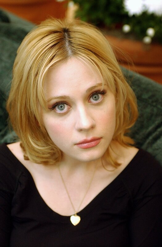 woman with blonde hair and blue eyes