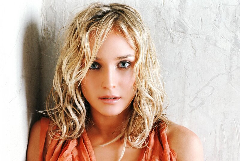 woman with blonde hair and blue eyes