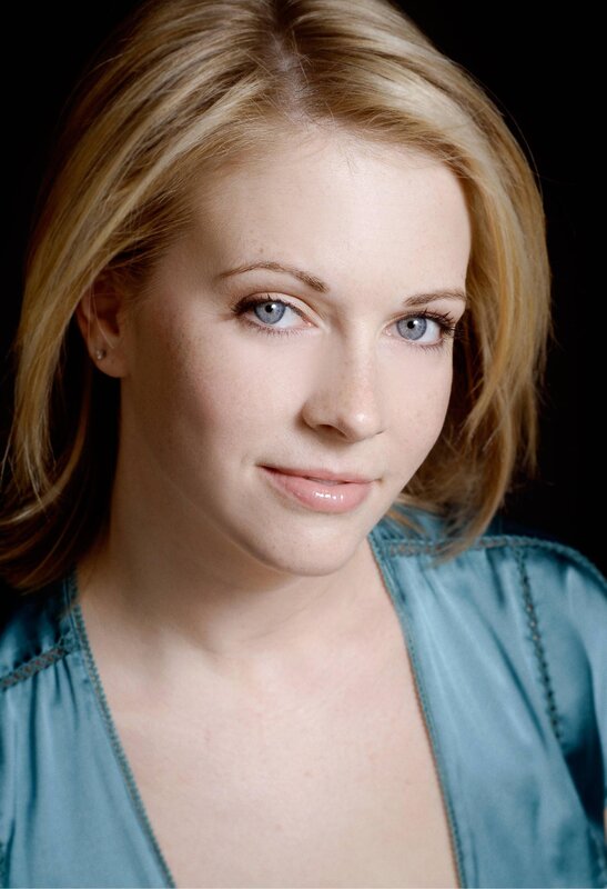woman with blonde hair and blue eyes