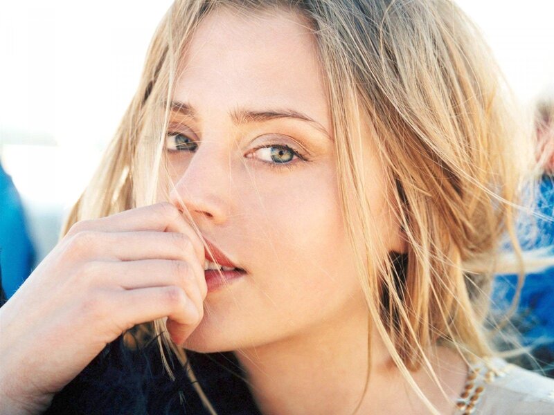 woman with blonde hair and blue eyes