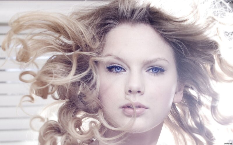 woman with blonde hair and blue eyes