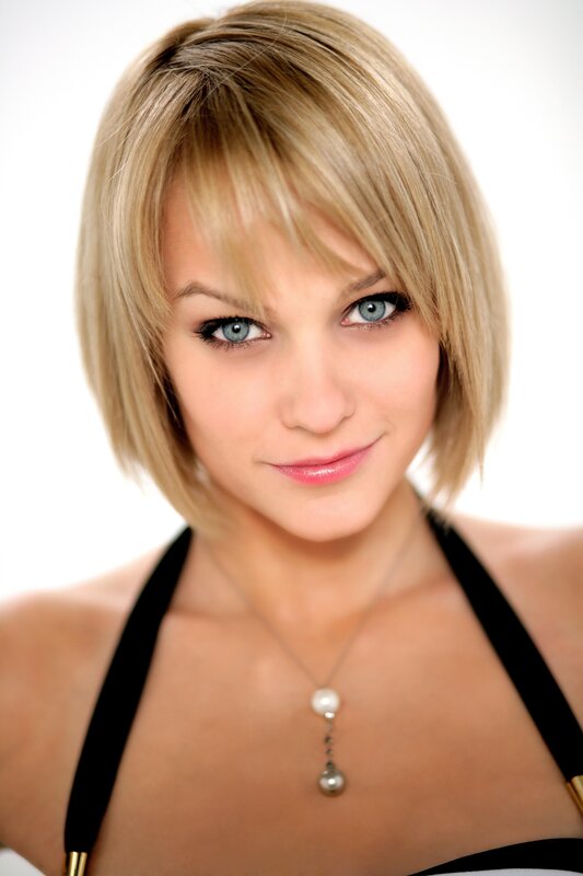 woman with blonde hair and blue eyes