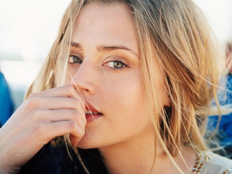 woman with blonde hair and blue eyes