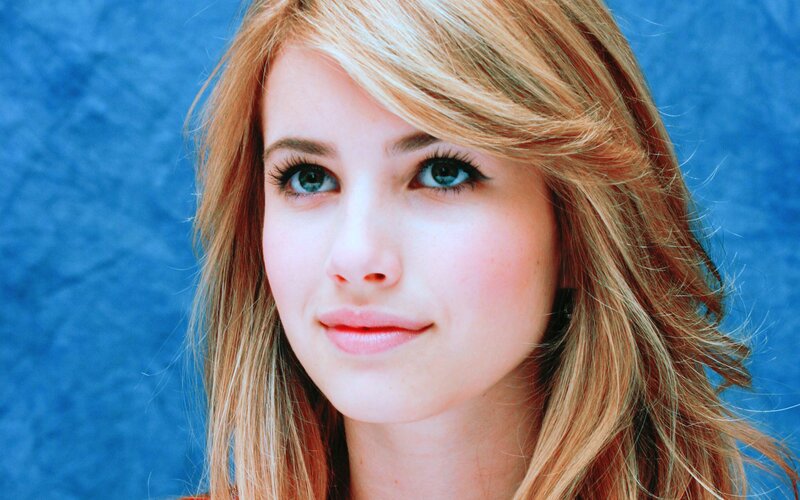 woman with blonde hair and blue eyes
