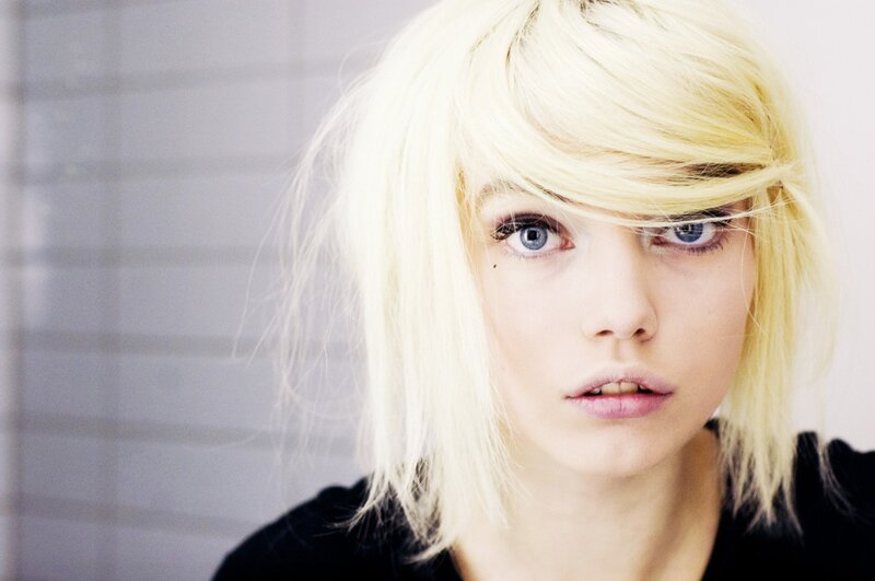 woman with blonde hair and blue eyes